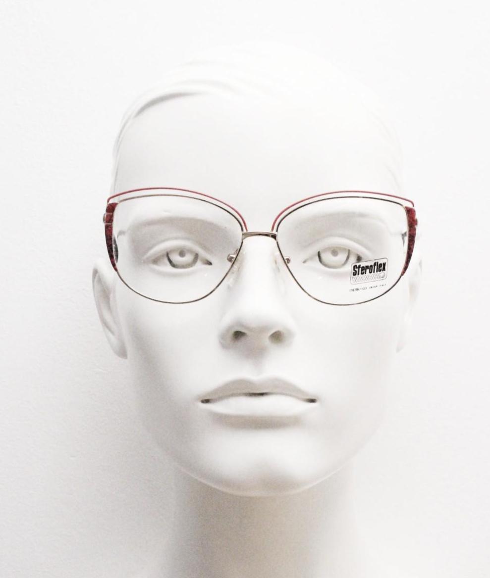 Luxottica 80s vintage gold metal eye glasses made in Italy. Inventive double brow with red highlights. Optical frame. Prescription NOS