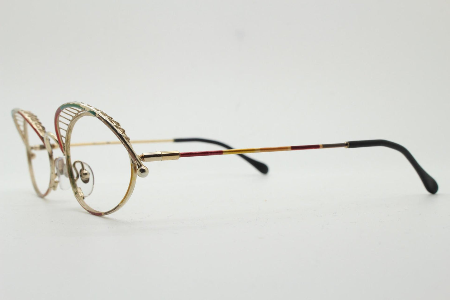 Casanova 80s vintage oval eye glasses. Incredible eyebrow canopy design with multi coloured finish. Optical frames. Prescription spectacles
