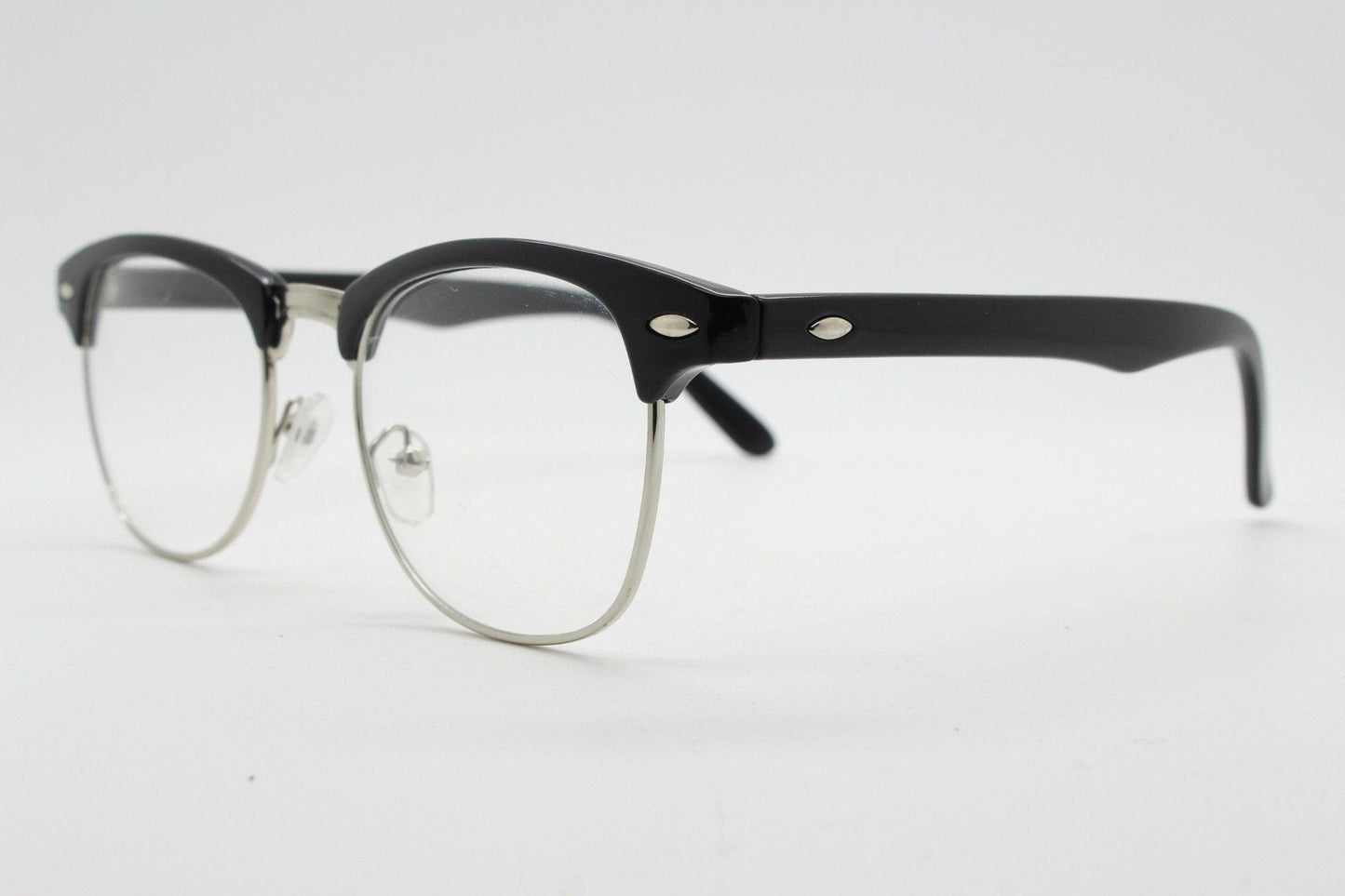 90s vintage black half frame eye glasses. Black gloss browline with silver wire rim frame and clear lenses. Classic 50s, 60s design. NOS
