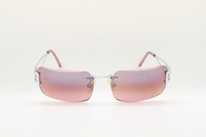 Y2K vintage rectangle frameless visor sunglasses. 2000's chrome trim wrap around with pink curved and bevelled lenses. 00's NOS