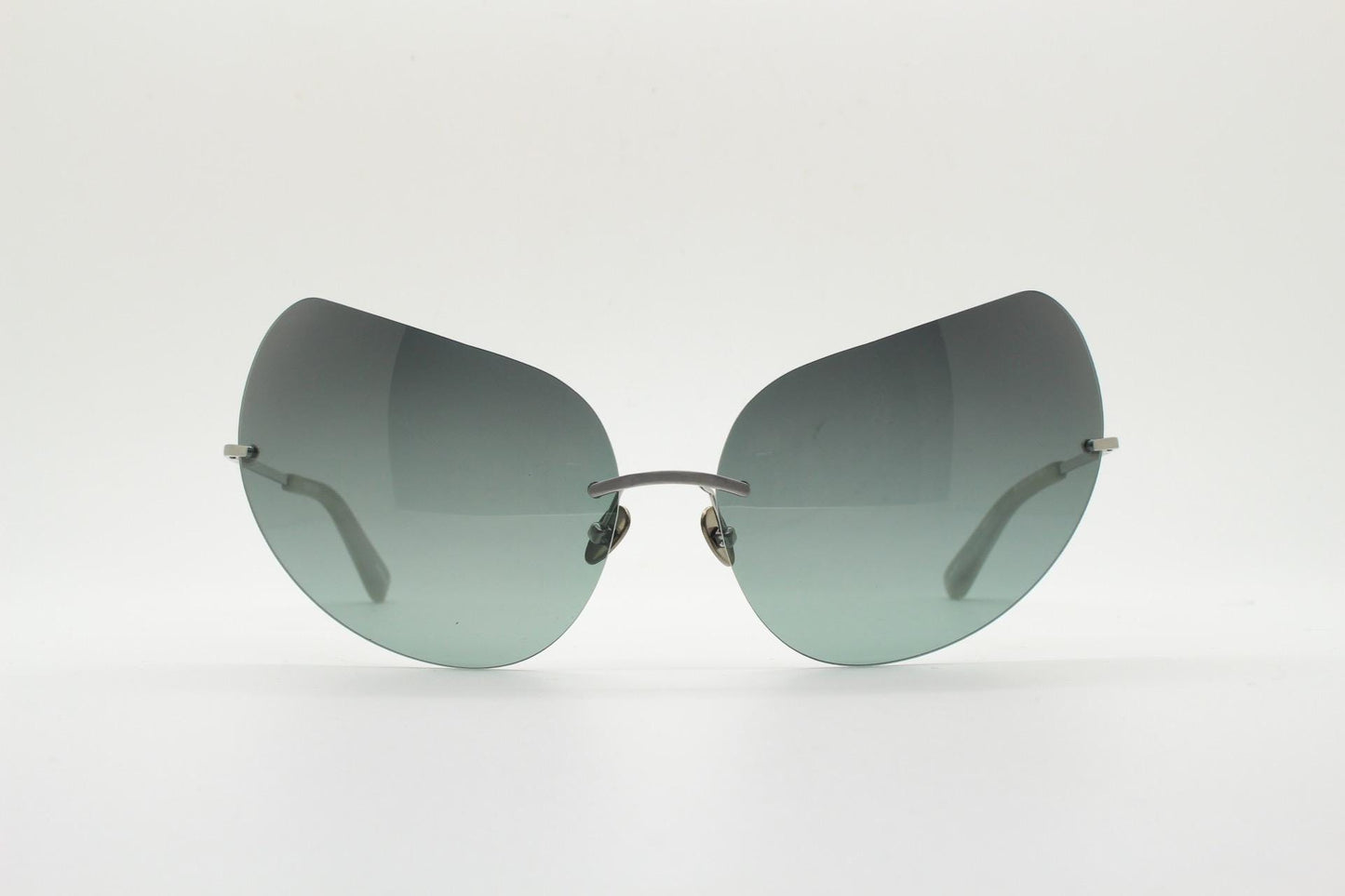 Linda Farrow cat eye sunglasses made in Japan by Todd Lynn. Massive frameless green cateye. Luxe Gallery Projects Vintage. NOS Full Set