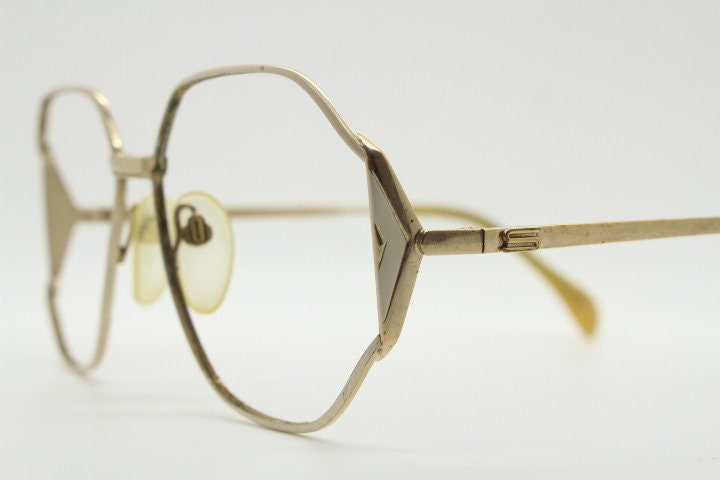 Silhouette 70s vintage octagon eye glasses. Womens sophisticated angular golden optical frame with white detail. Prescription eyeglasses. Rx