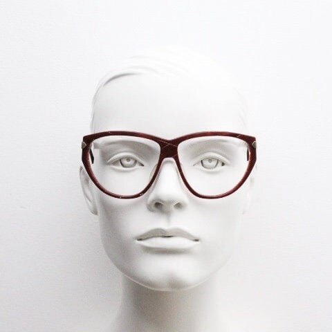 Silhouette 80s vintage oversized cat eye glasses made in Austria. Dramatic red prescription optical frame with subtle criss cross stripes RX