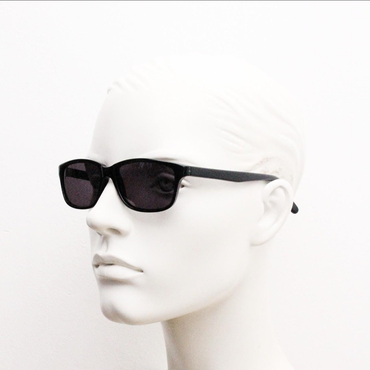 Vintage 90s slim rectangular modified wayfarer design sunglasses made in Italy. All black gloss low profile acetate frame. Unused NOS
