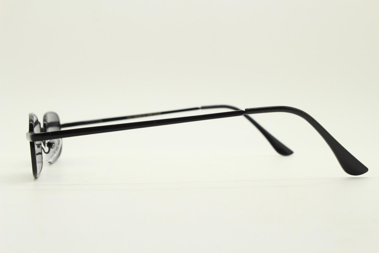 90s vintage small rectangular sunglasses. Imposing minimal all black gloss victorian style frame with dark lenses. Steampunk. Unused NOS