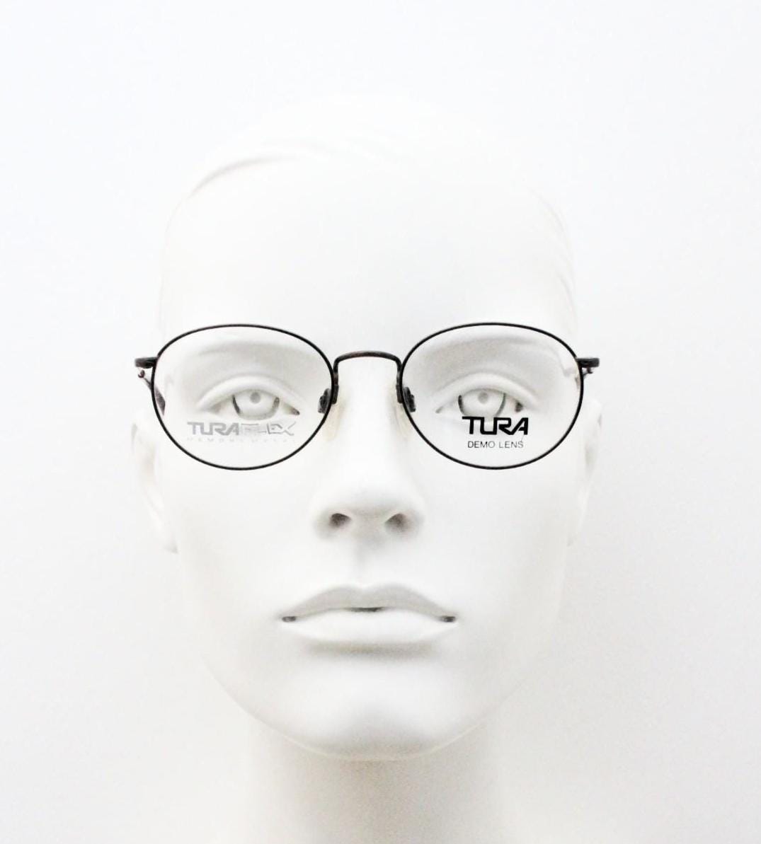 Tura 90s vintage oval eye glasses made in Japan. Satin metallic bronze finish optical frame in neat proportions. Prescription. Unused BNWT