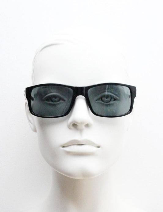 Y2K vintage sharp rectangular sunglasses. Large curved black gloss frame with dark green lenses and silver arrow arm crests. NOS