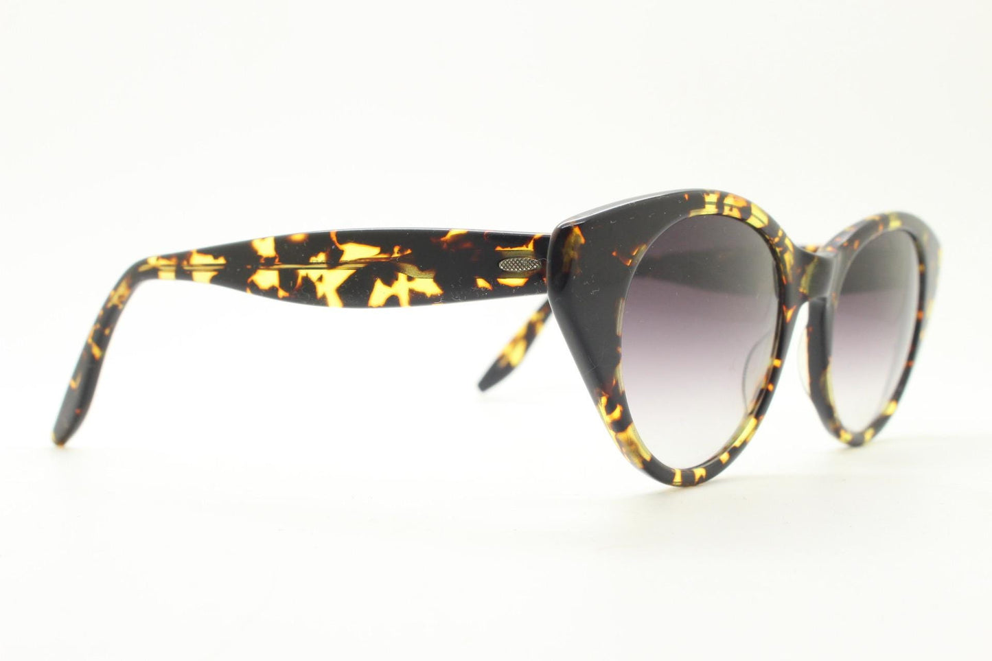 Barton Perreira subtle cat eye sunglasses model kismet. Honey tortoise acetate frame with cropped sides and graduating lenses