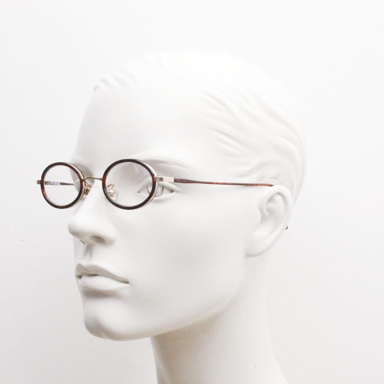 90s vintage small oval eye glasses. Gold metal frame 20s design optical frames with tortoise inserts and arms. Prescription. Spectacles NOS