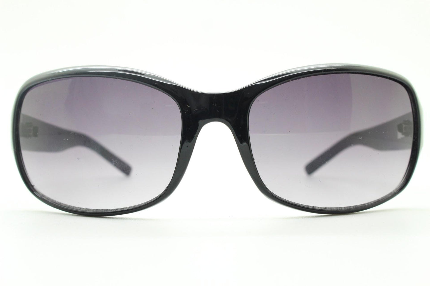 Y2K vintage curved wraparound sunglasses. Aerodynamic plain black gloss curved wrap frame. Minimal shield design. NOS
