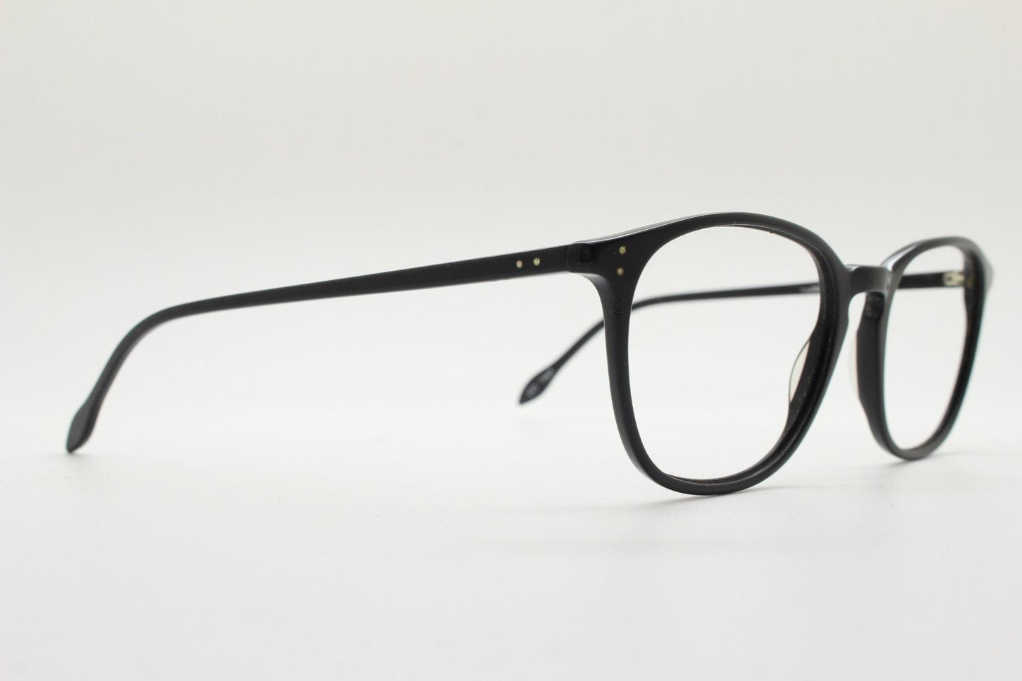 London Retro rectangular eye glasses. Plain black gloss acetate optical frames with keyhole bridge. Prescription eyeglasses. RX spectacles