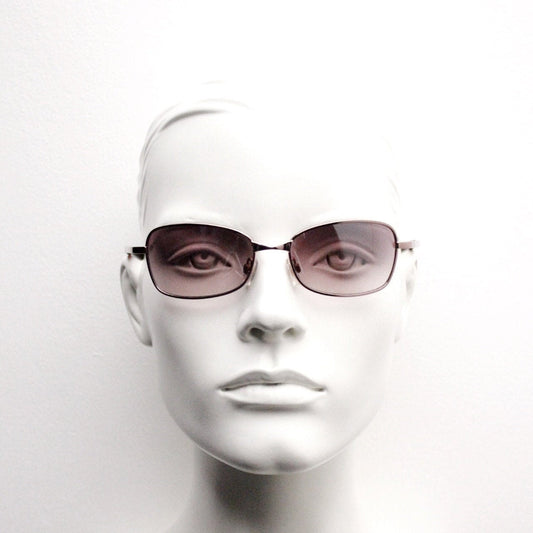 Y2K vintage curved sunglasses. Unusual Pink chrome metal frame with matching flared rectangular lenses. Unused 2000s NOS