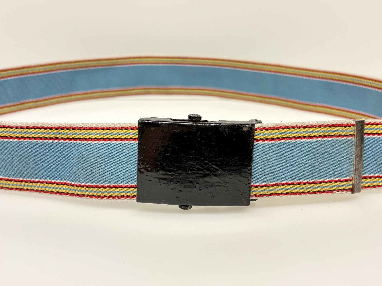 Y2K vintage 2' canvas army style belt in sky blue with red, white and yellow rainbow stripes. 2000s Mens large. Fully adjustable size range