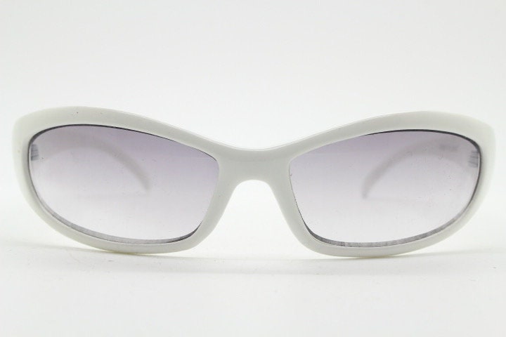 Y2k vintage wrap around bug eye sunglasses. Curving ice white shield frame with light tone lenses. Rave. Super hero cosplay 2000s NOS