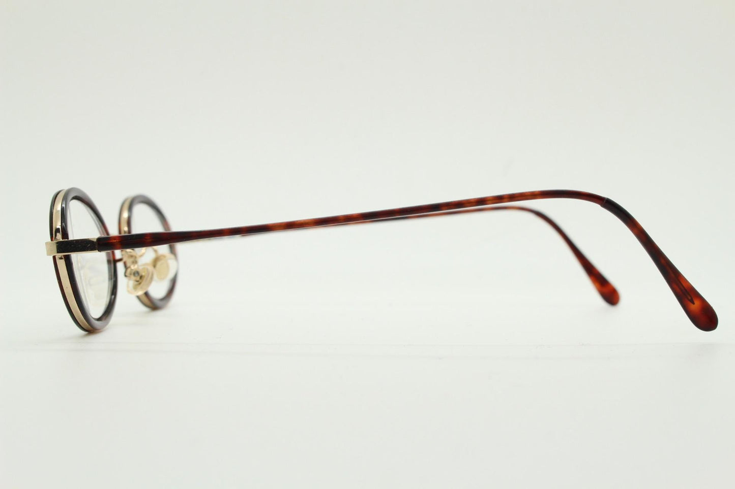 90s vintage small oval eye glasses. Gold metal frame 20s design optical frames with tortoise inserts and arms. Prescription. Spectacles NOS