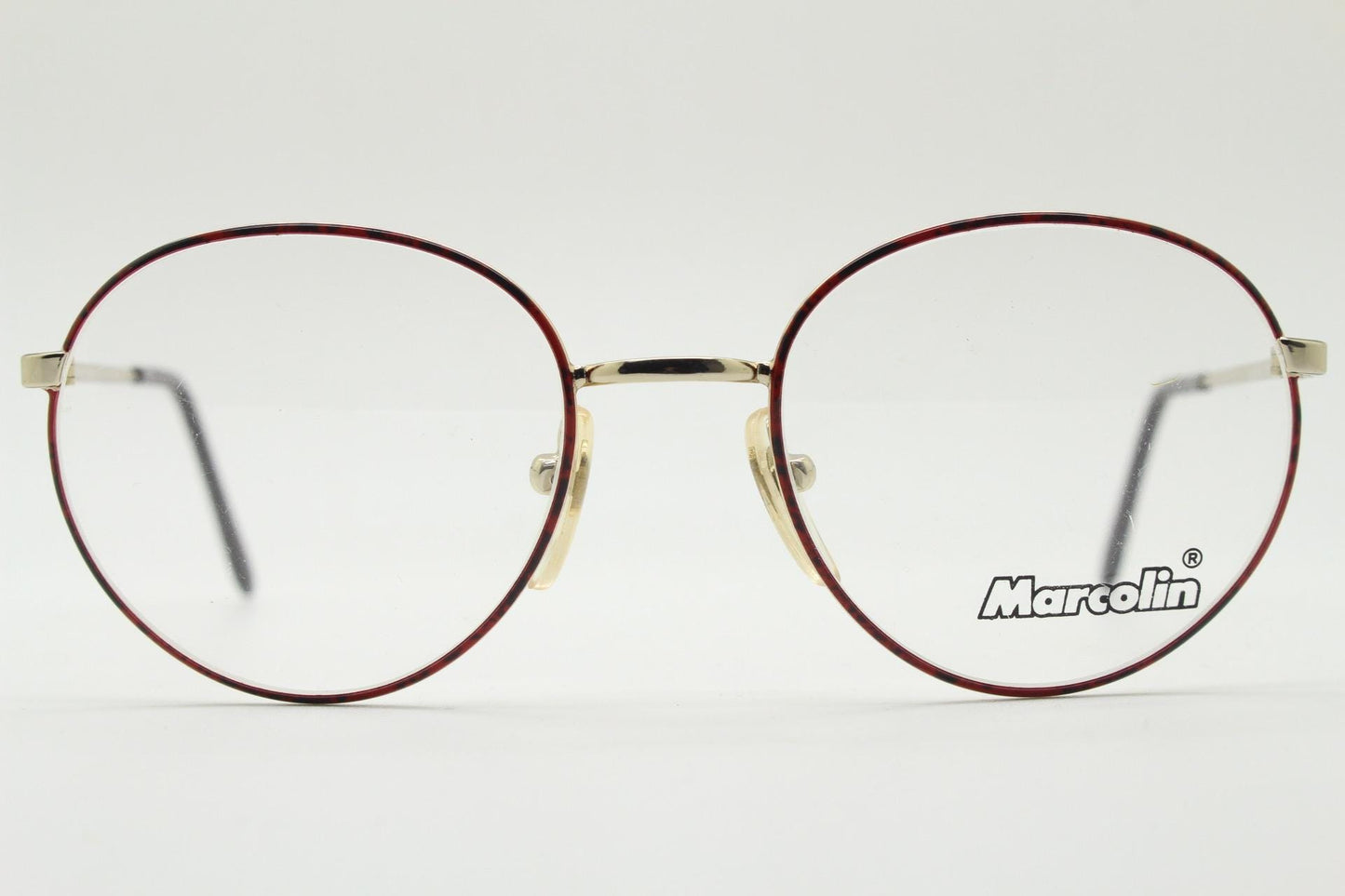 Marcolin 90s vintage round metal eye glasses made in Italy. Panto shape optical frames with attractive red and black front. Prescription RX