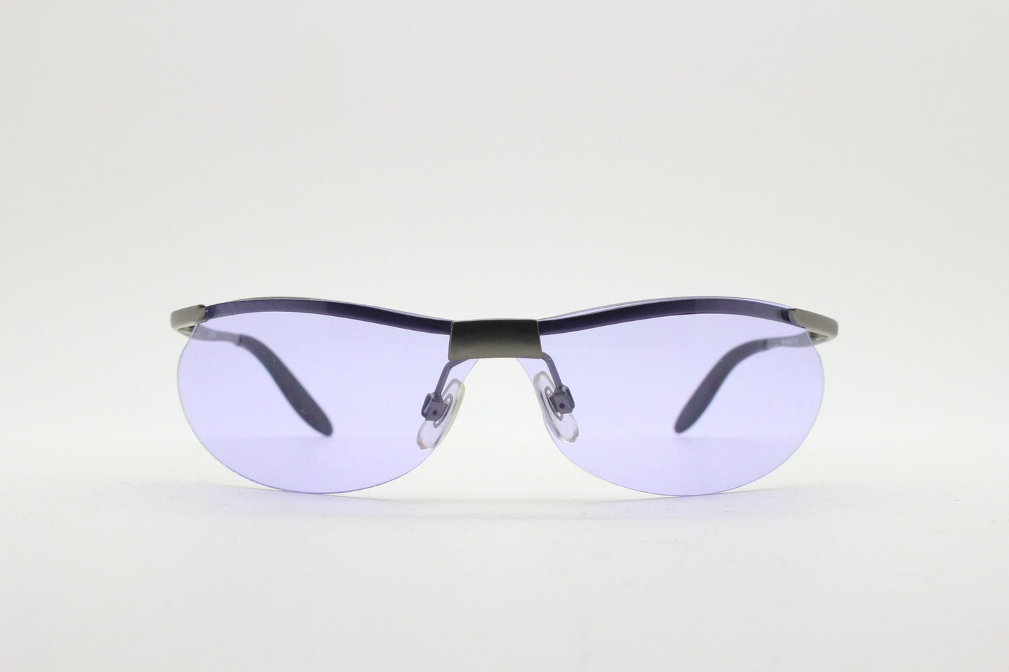 Y2K vintage sport shield sunglasses. 2000's half frame wraparound aerodynamic mini mask visor with purple bug eye lenses. 90s 00s unused NOS