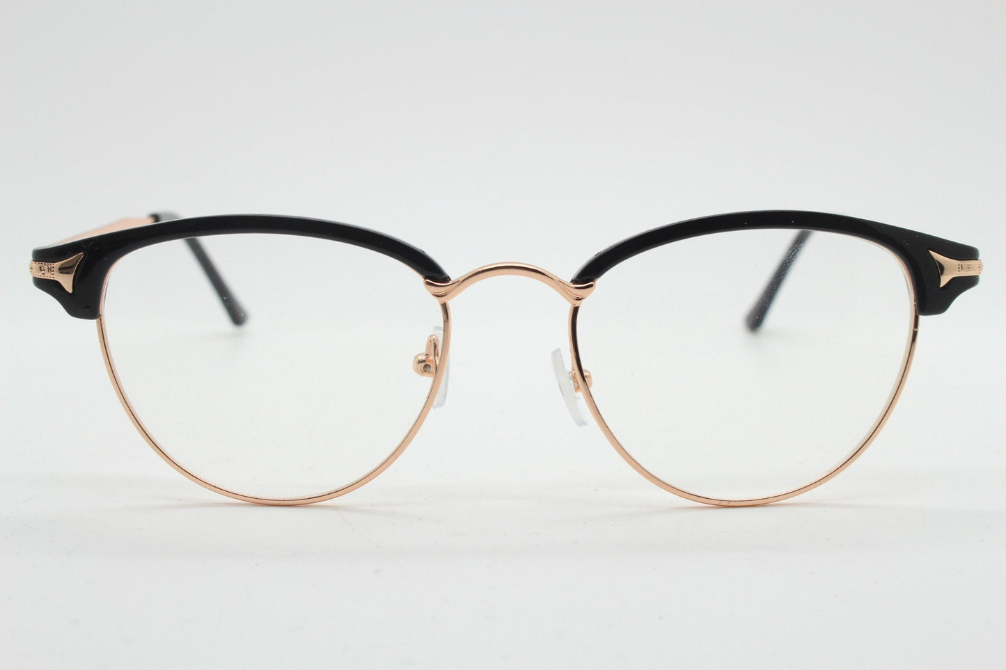 90s vintage browline cat eye glasses. Black gloss and gold half frame eyeglasses. 50s, 60s cateye design with clear lenses. NOS