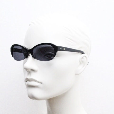Stylised vintage oval praying mantis cateye sunglasses made in Japan. Superior Japanese black gloss acetate half frame bug eye