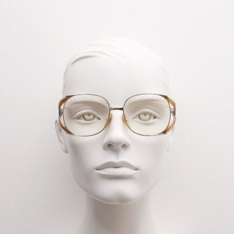 Christian Dior 70s vintage round eyeglasses model 2524 made in Germany from Optyl. Transparent brown optical frame. Prescription eyeglasses