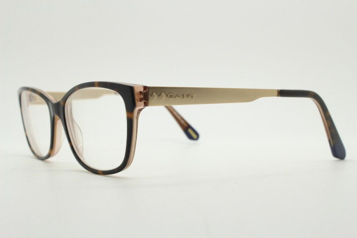 Gant vintage modified cat eye glasses model 4060. Tortoise acetate and satin metal arm cateye optical frames. Womens prescription spectacles