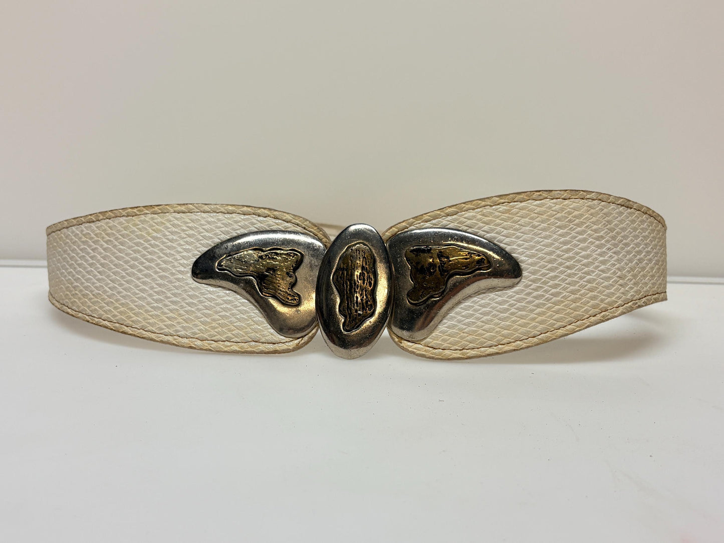 80s vintage womens white textured vinyl flattering dress belt with substantial butterfly shape metal buckle with brass implants