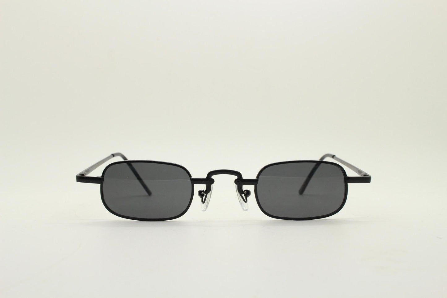 90s vintage small rectangular sunglasses. Imposing minimal all black gloss victorian style frame with dark lenses. Steampunk. Unused NOS
