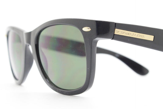 BCBG Max Azria vintage wayfarer design sunglasses. All time classic horn rim format in plain black gloss frame with green lenses.