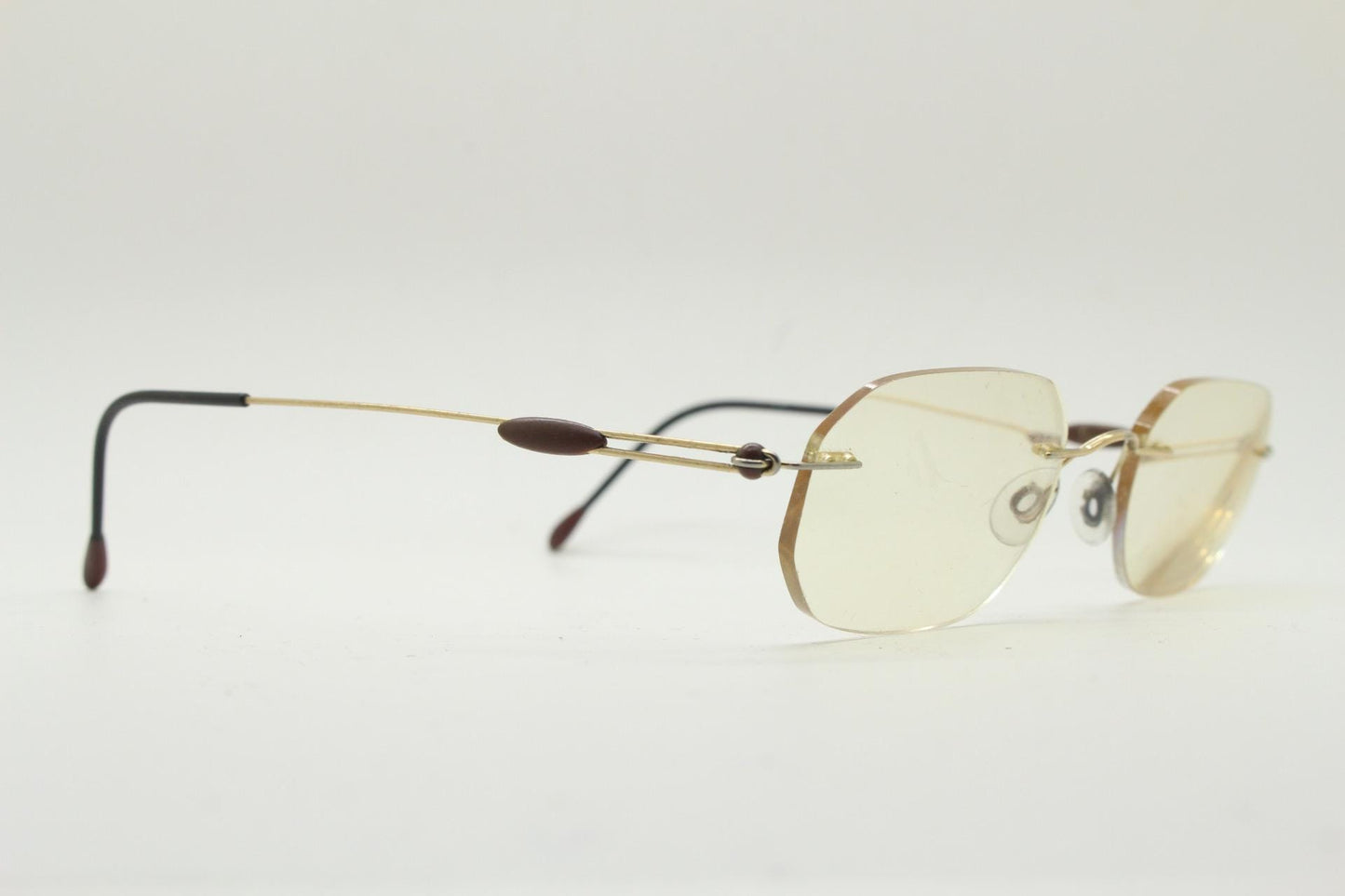 Silhouette vintage angular oval frameless eye glasses made in Austria. Minimal lightweight titanium optical frame. Prescription spectacles