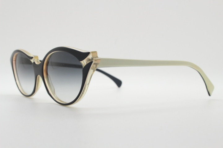 Alain Mikli Paris cat eye glasses made in France. Radical redefinition of the cateye optical frame. Womens prescription eyeglasses. RX