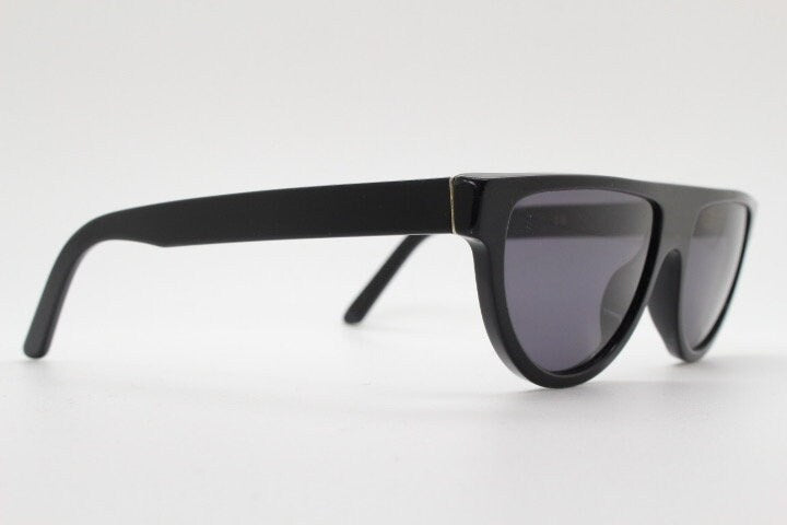 Retrosuperfuture thick flat top cat eye sunglasses hand made in Italy. All black gloss acetate frame. Vintage