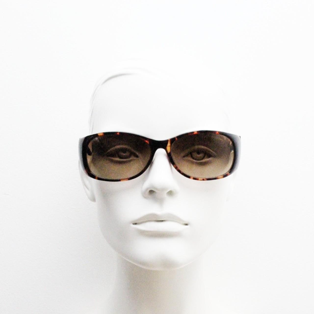 Y2k vintage wrap around bug eye sunglasses. Aerodynamic 60s design tortoise frame with full height arms in excellent proportions. 2000's NOS