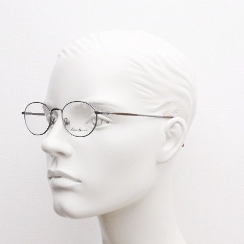 Eddie Bauer 90s vintage oval eye glasses.Grey matt finish optical frames with subtle brown trim. Prescription RX spectacles. NOS