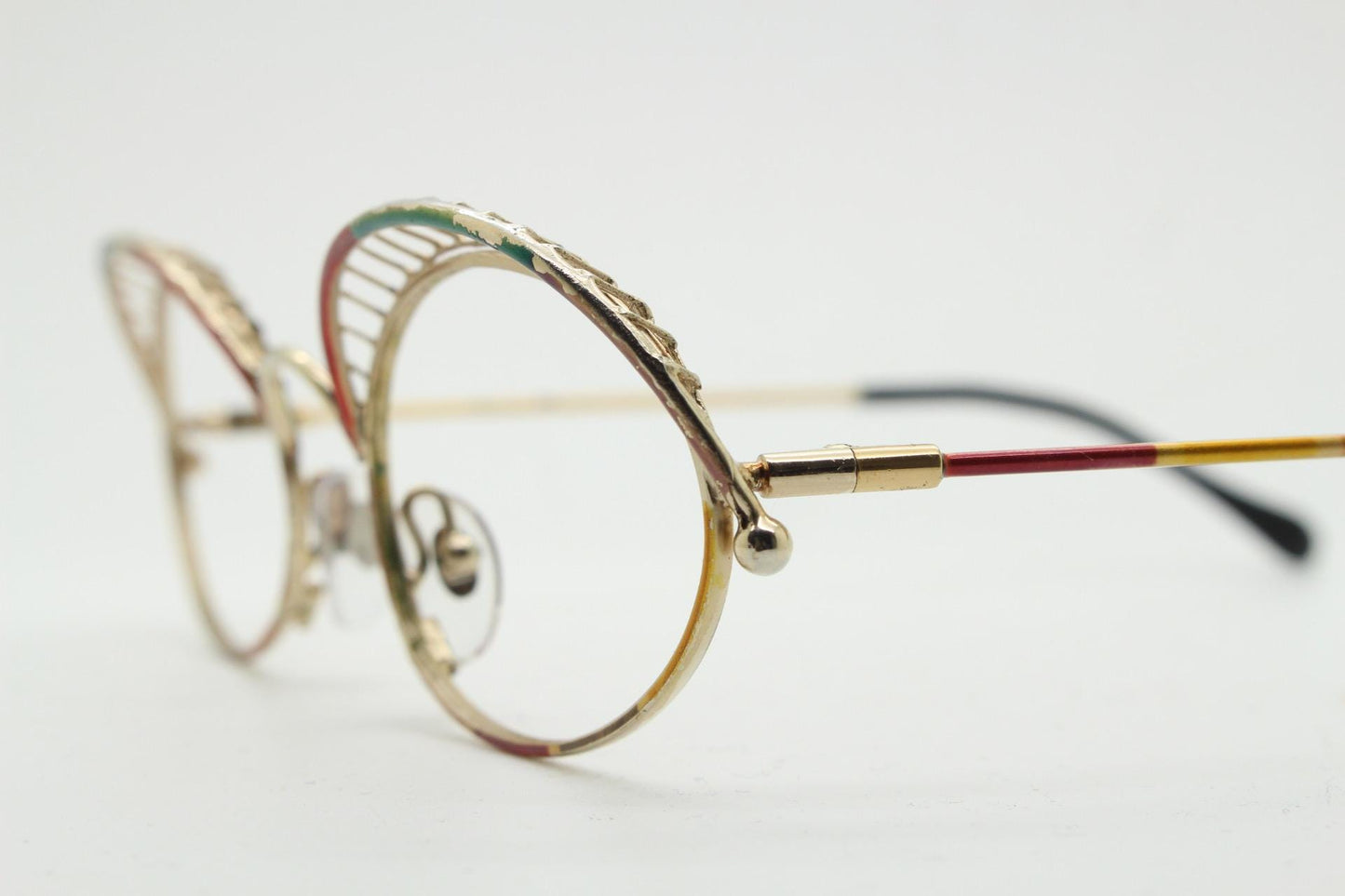 Casanova 80s vintage oval eye glasses. Incredible eyebrow canopy design with multi coloured finish. Optical frames. Prescription spectacles