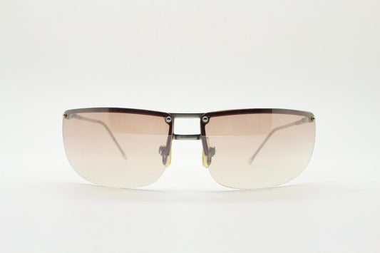 Y2K vintage visor sunglasses. Flat top half frame wraparound shield design with light tone graduating curved lenses. 2000's. NOS