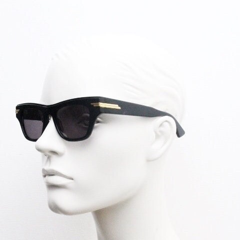 Bottega Veneta thick flat top cat eye sunglasses made in Japan. Black gloss acetate frame with sharp cropped sides. Womens cateye. BNWOT