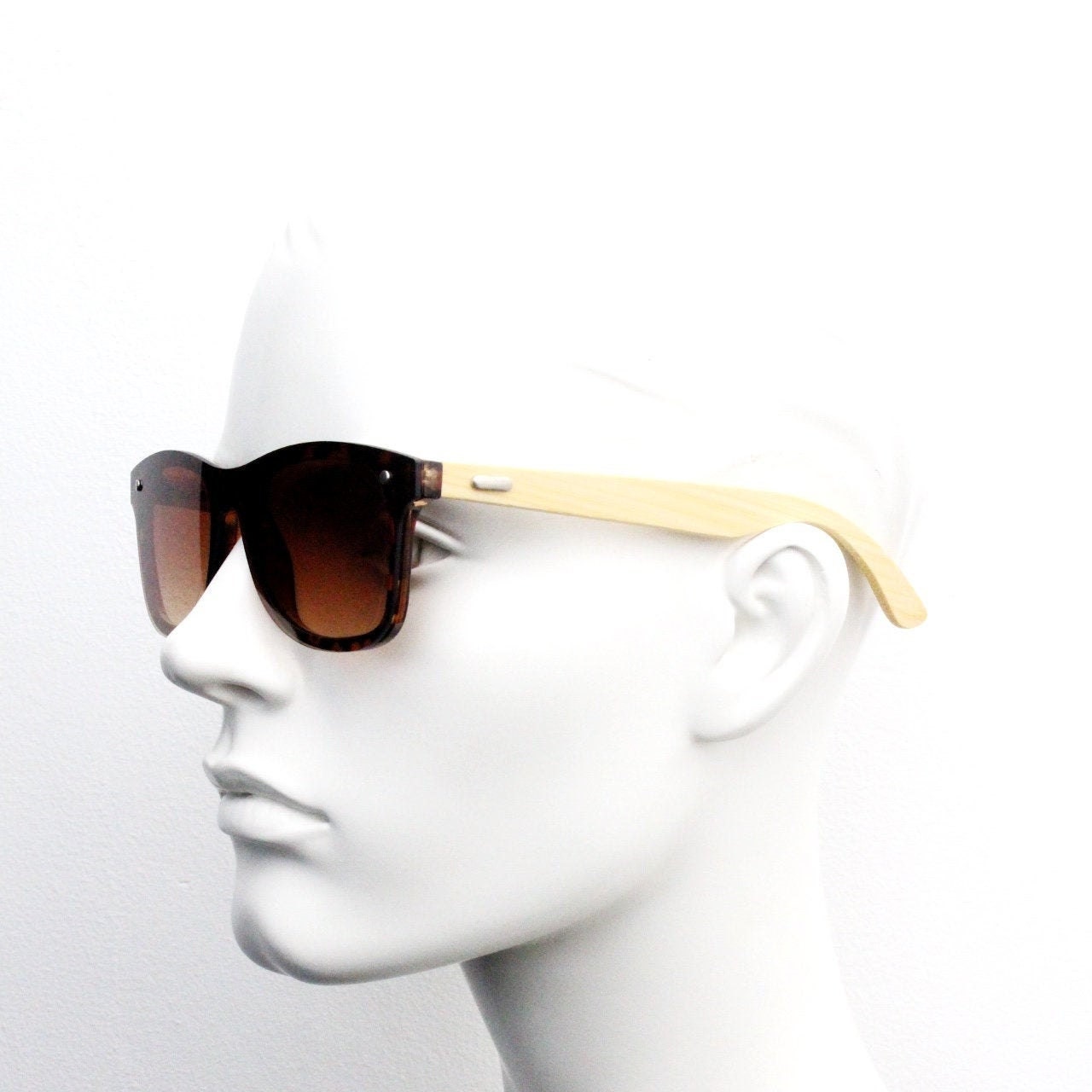 Vintage Y2K modified wayfarer style hand made sunglasses. Tortoise flat front monolens design with real wooden arms. Unused NOS