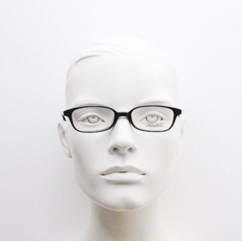 Sting 90s vintage rectangular eye glasses made in Italy. Plain black gloss low profile acetate optical frames. Prescription RX. NOS