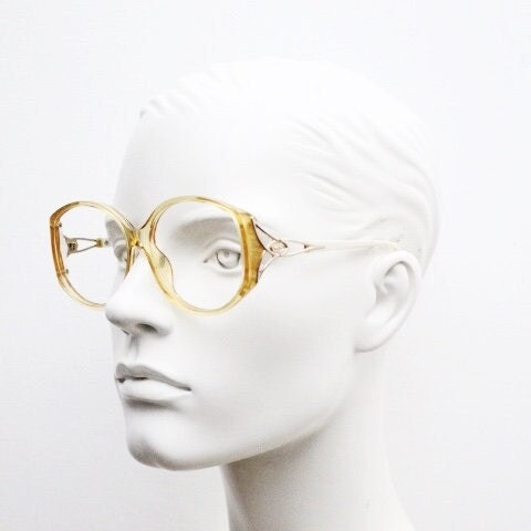 Christian Dior 70s vintage big round eye glasses made in Austria. Brown Optyl optical frames with distinctive logo. Prescription RX. NOS