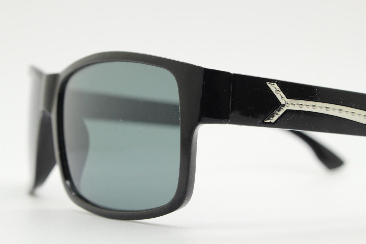 Y2K vintage sharp rectangular sunglasses. Large curved black gloss frame with dark green lenses and silver arrow arm crests. NOS