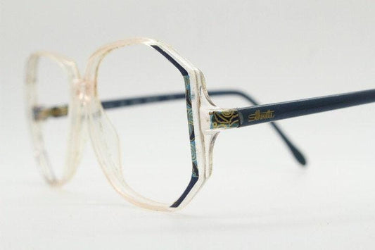 Silhouette 80s vintage hexagon eye glasses made in Austria. Transparent crystal optical frame with abstract blue pattern. Prescription. 70s