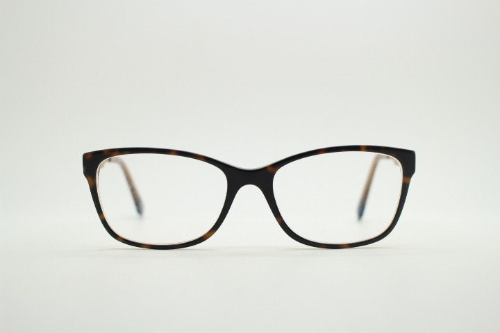 Gant vintage modified cat eye glasses model 4060. Tortoise acetate and satin metal arm cateye optical frames. Womens prescription spectacles