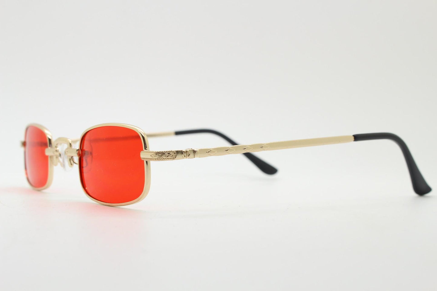 90s vintage small rectangular sunglasses. Imposing minimal gold metal victorian style frame with deep red lenses. Unused BNWT