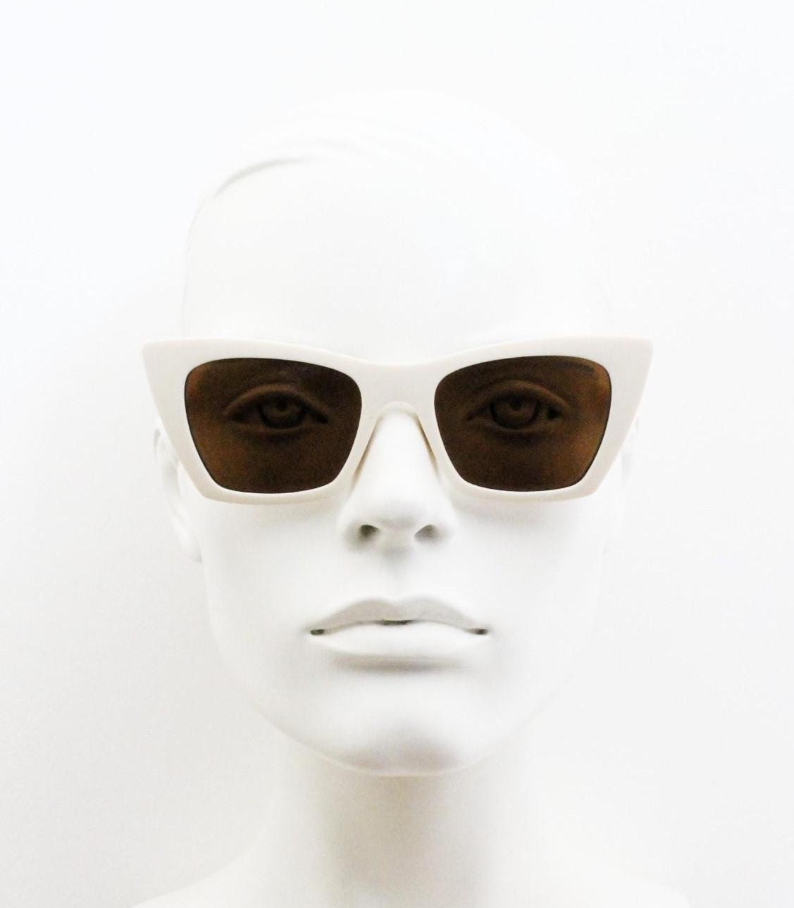 Carrera Vintage pointed cat eye sunglasses. Tasteful retro 50s repro in neat proportions with white matt frame and  brown lenses. NOS cateye