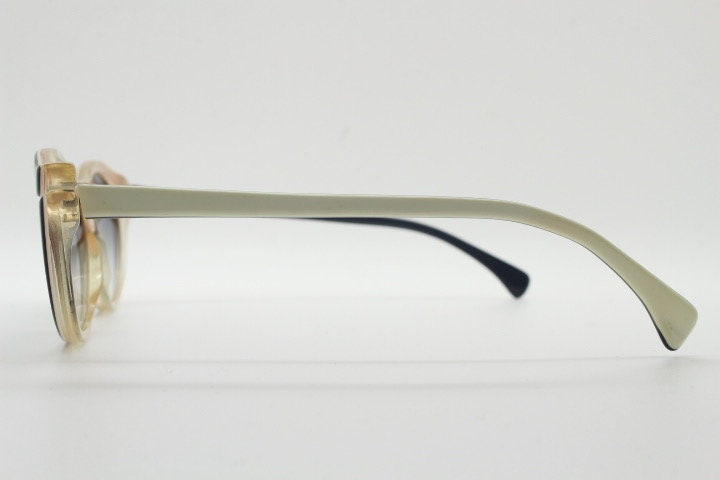 Alain Mikli Paris cat eye glasses made in France. Radical redefinition of the cateye optical frame. Womens prescription eyeglasses. RX