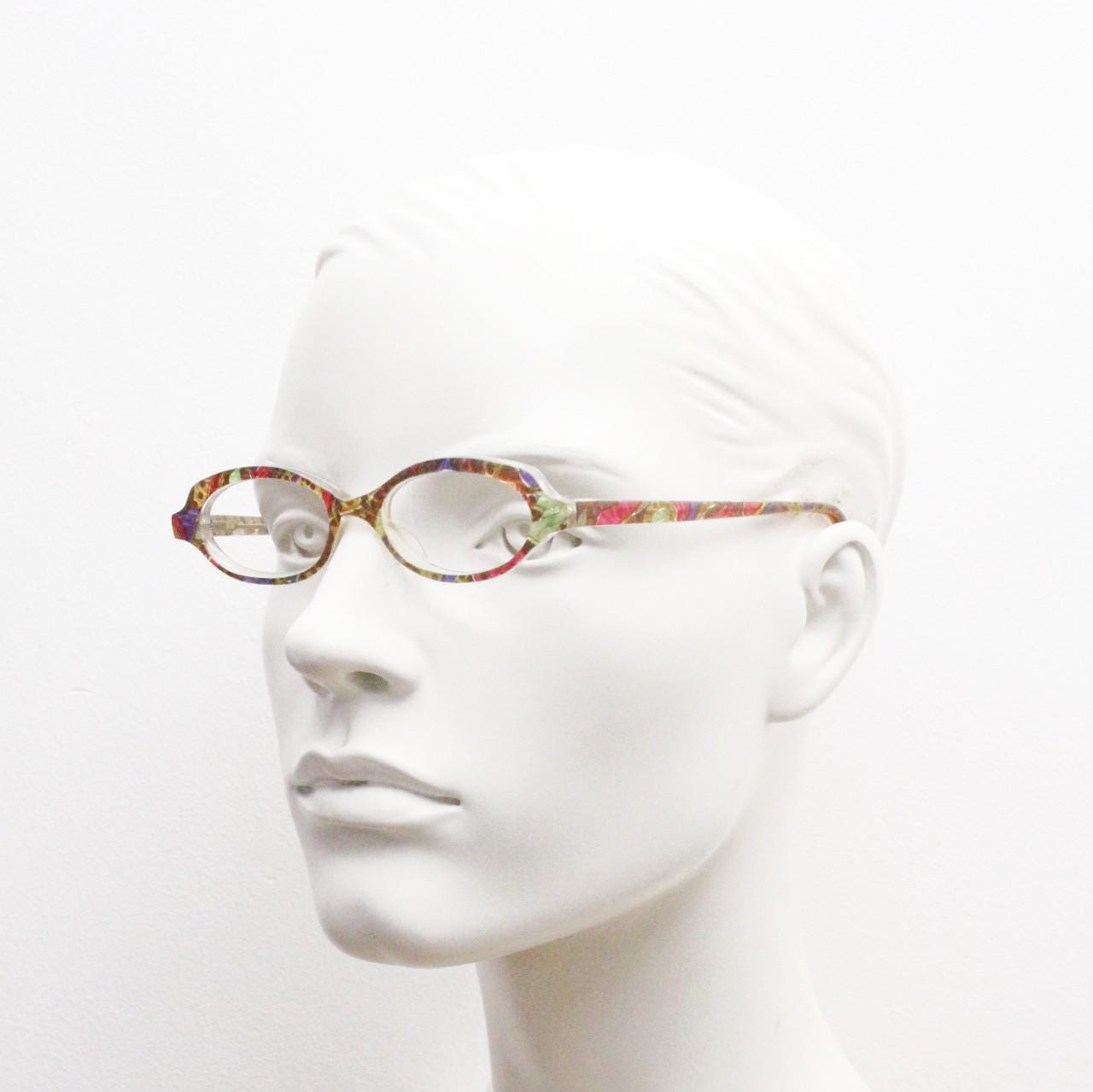 90s vintage small oval eye glasses. Low profile acetate optical frame with extraordinary abstract multi coloured pattern. Prescription RX