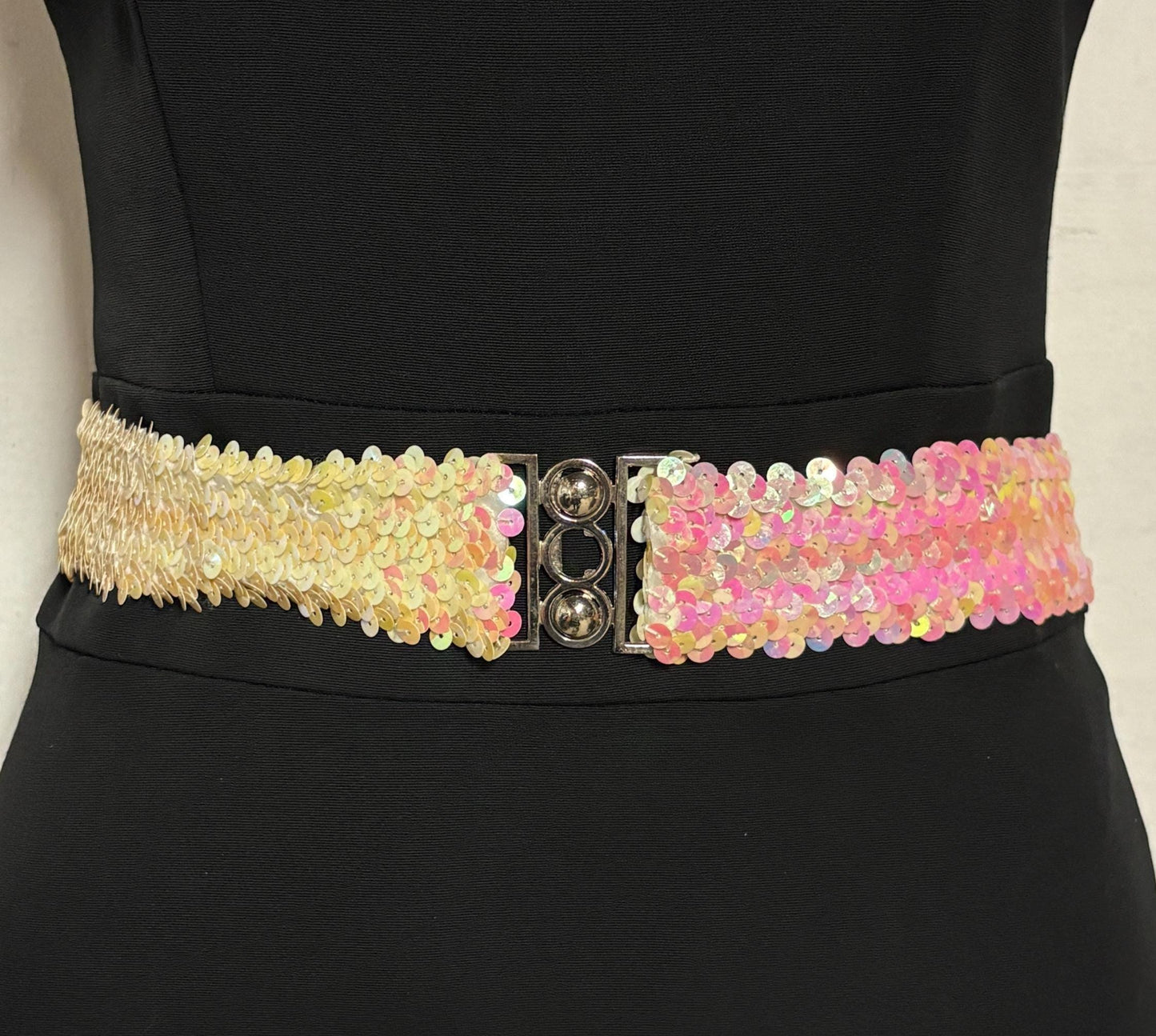 70s vintage womens elastic pink and white sequin stretch belt with chrome circles buckle. To wear with a dress. Authentic disco belt