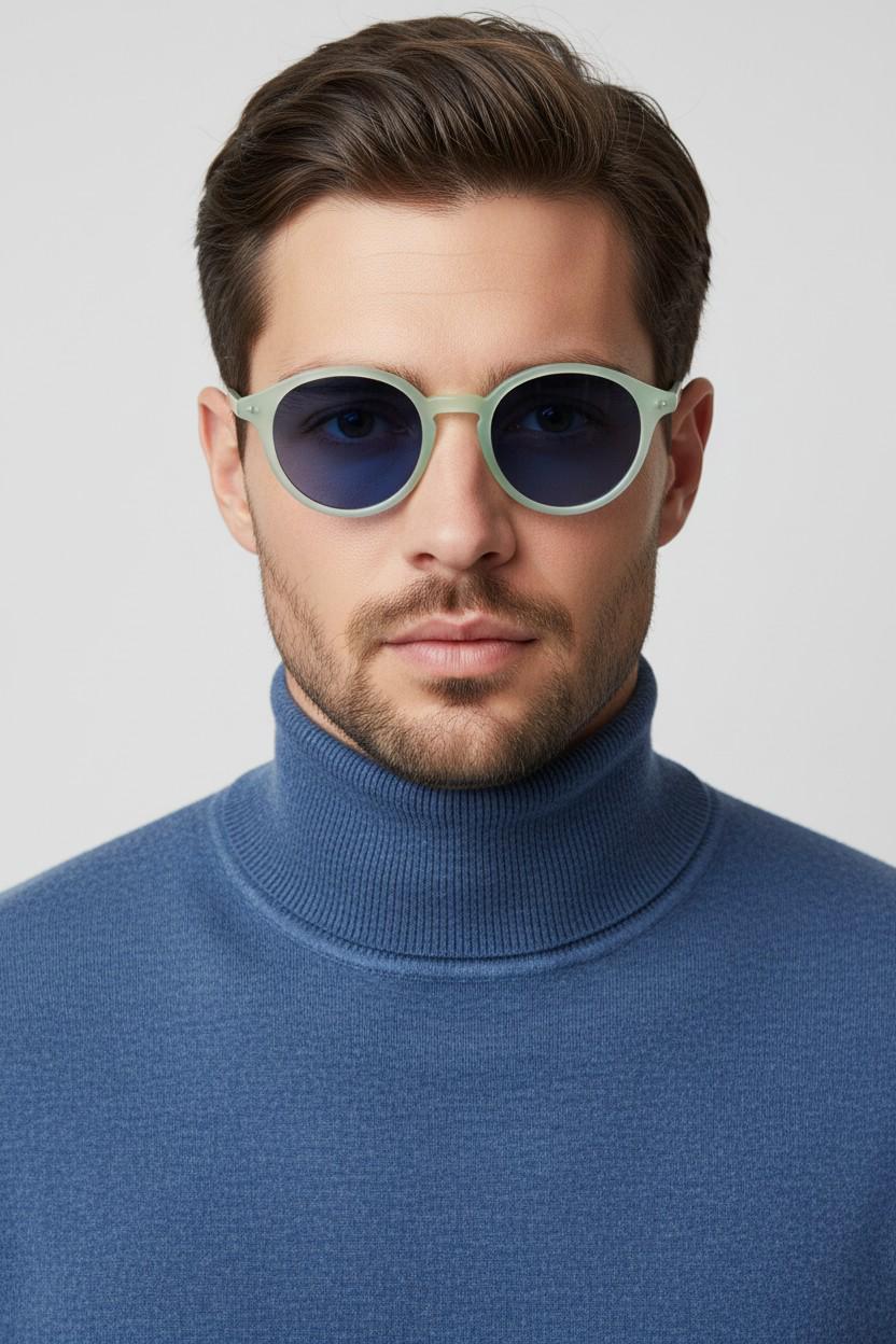 Sergio Tacchini 80s vintage round horn rim sunglasses made in Italy. Transparent pale blue frosted acetate frame with navy lenses. NOS