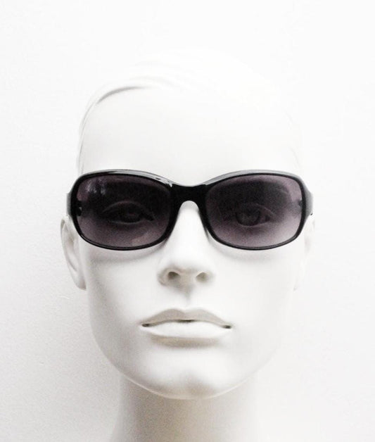 Y2K vintage curved wraparound sunglasses. Aerodynamic plain black gloss curved wrap frame. Minimal shield design. NOS