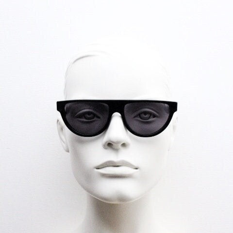 Retrosuperfuture thick flat top cat eye sunglasses hand made in Italy. All black gloss acetate frame. Vintage